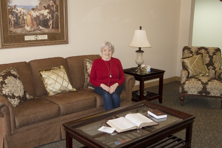 assisted living community resident reading book at Maranatha Village